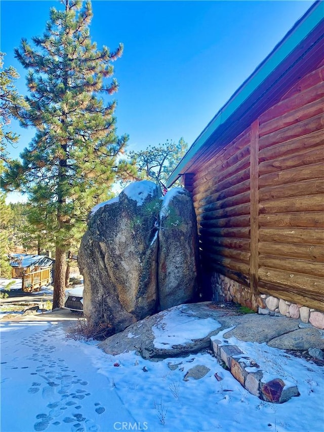 view of side of property featuring log exterior