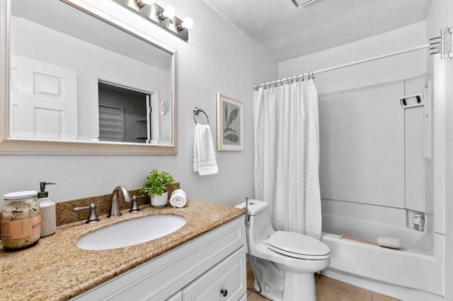 full bathroom with vanity, tile patterned flooring, toilet, and shower / bath combo with shower curtain