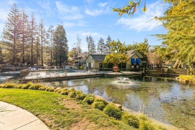 view of property's community featuring a water view