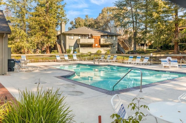 view of pool featuring a patio area