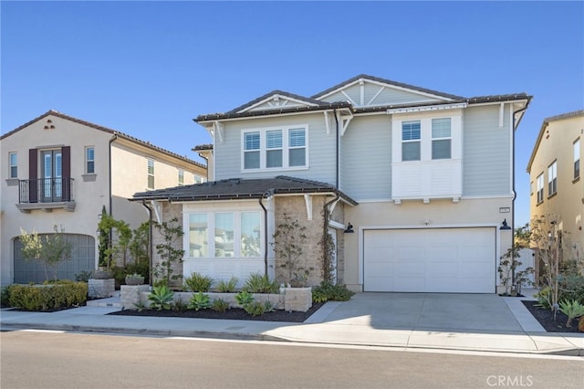 front of property featuring a garage