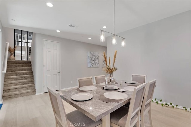 dining area with light wood-type flooring