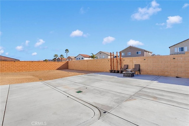 view of patio featuring a fire pit