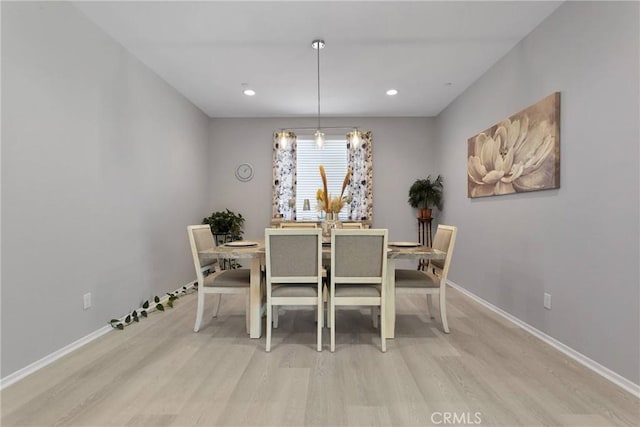 dining room with light hardwood / wood-style floors