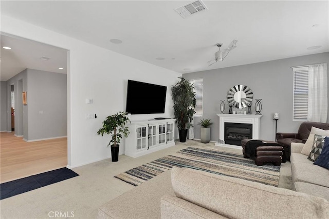 living room with light colored carpet