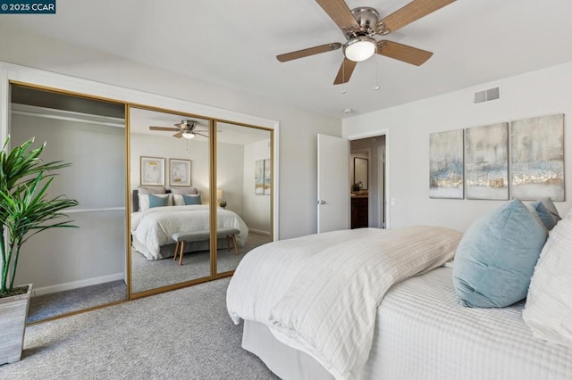 bedroom featuring a closet, ceiling fan, and carpet flooring