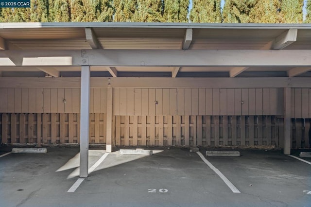 view of parking featuring a carport