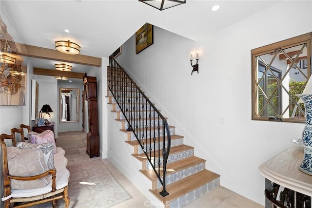 staircase featuring tile patterned floors