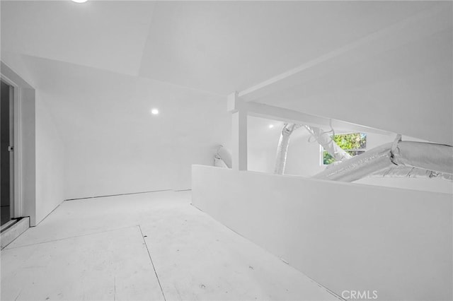 bathroom with vaulted ceiling