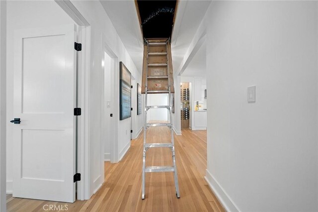 hallway featuring hardwood / wood-style floors