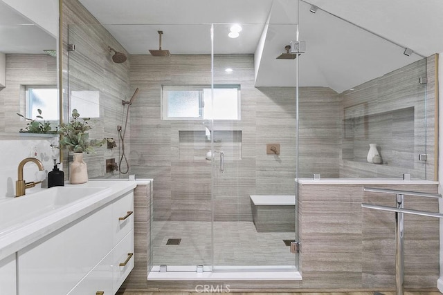 bathroom with vanity and walk in shower