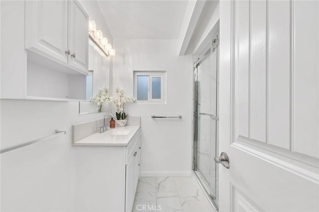 bathroom with vanity and an enclosed shower