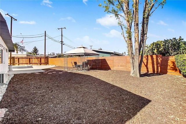 view of yard with a gazebo and a patio