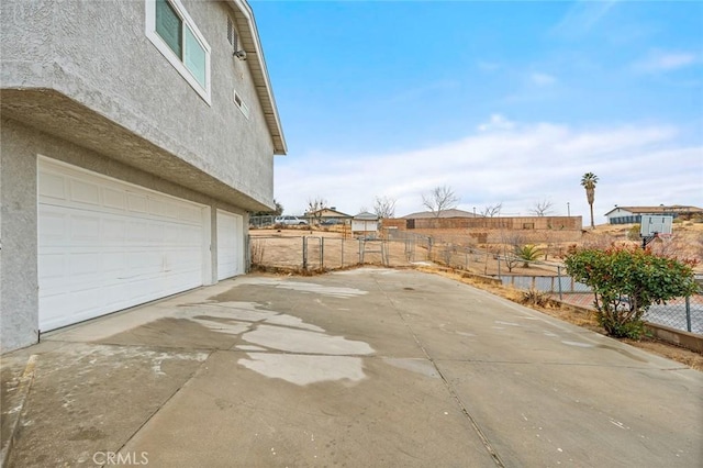 exterior space with a garage