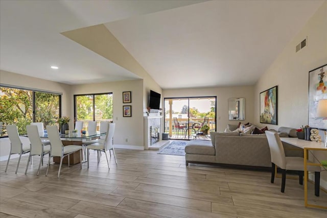 living room featuring vaulted ceiling