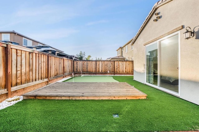 view of yard with a deck