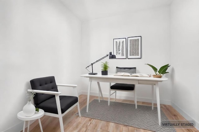 office area with hardwood / wood-style floors