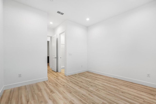 unfurnished room featuring light hardwood / wood-style flooring