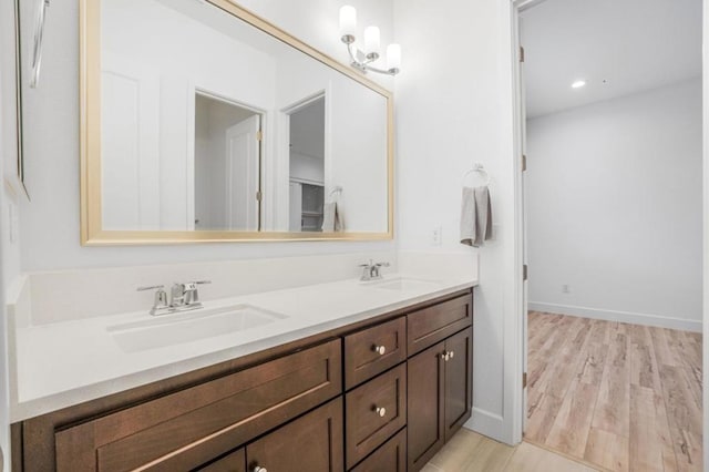 bathroom featuring vanity and hardwood / wood-style floors