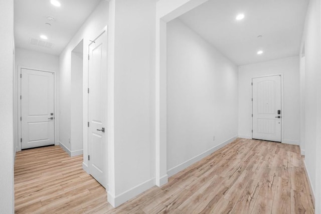 hallway featuring light hardwood / wood-style flooring