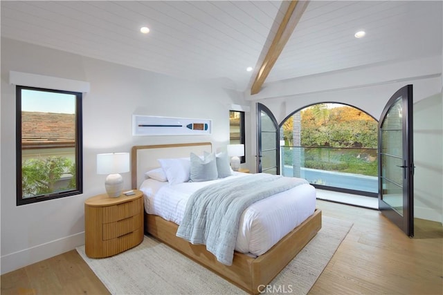 bedroom with wooden ceiling, access to exterior, beam ceiling, and light wood-type flooring