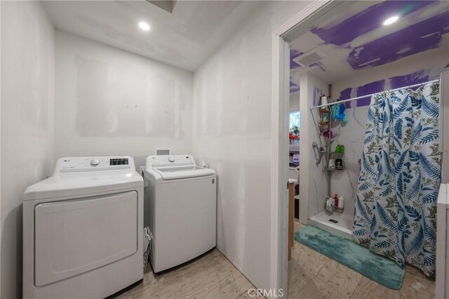 laundry room featuring independent washer and dryer