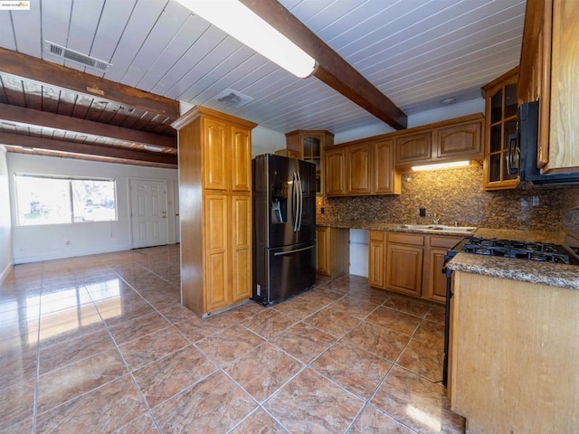 kitchen with black appliances, decorative backsplash, sink, wooden ceiling, and beam ceiling