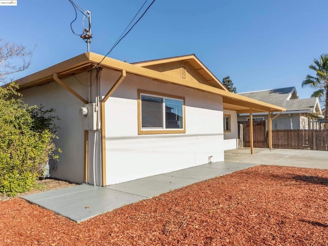 view of home's exterior with a patio area