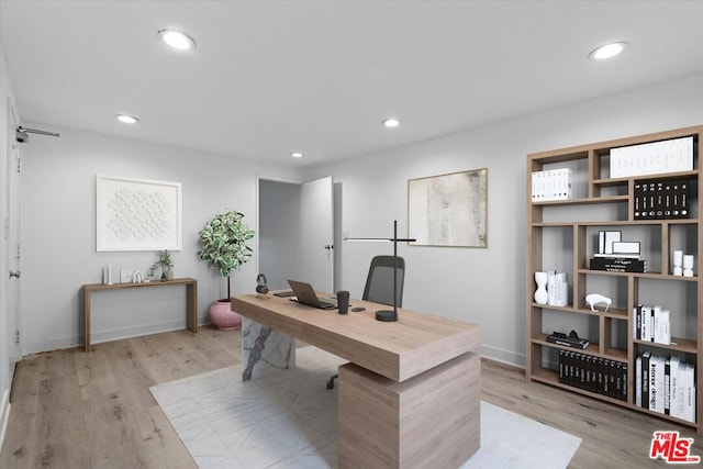 office space featuring light wood-type flooring