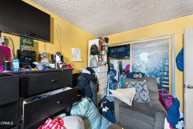 bedroom featuring a textured ceiling