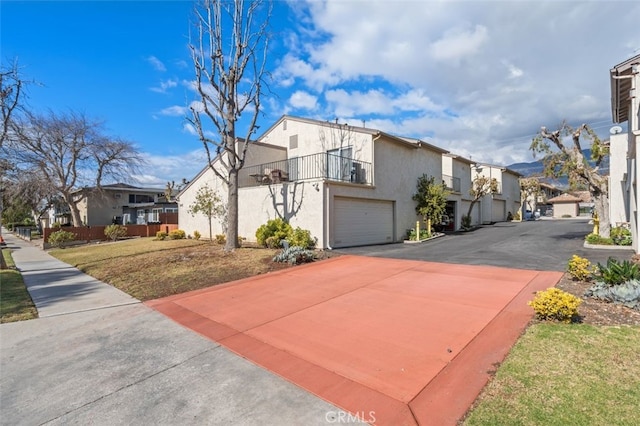 view of property exterior featuring a garage