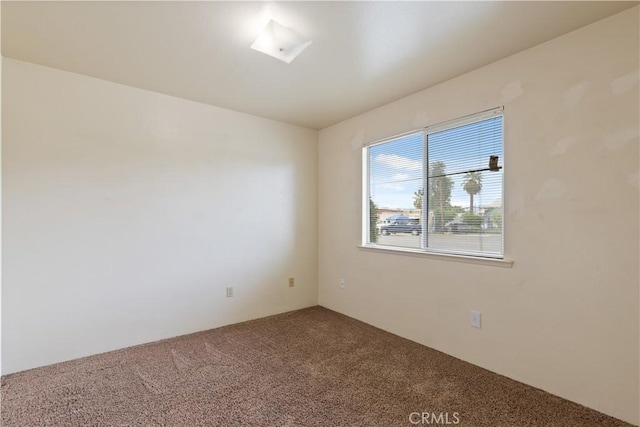 view of carpeted spare room