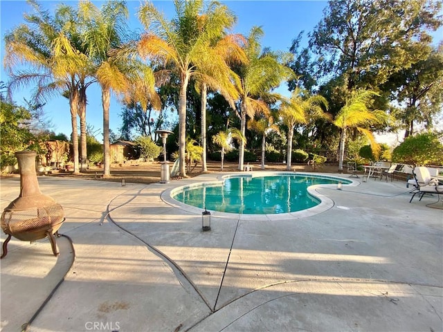 pool featuring a patio