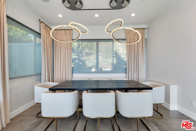 dining room with concrete floors