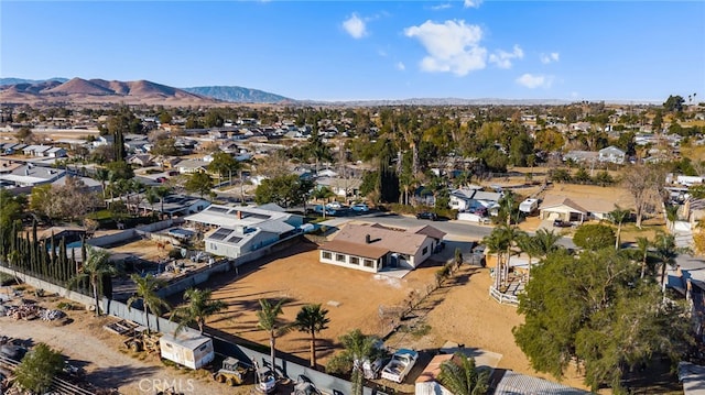 drone / aerial view featuring a mountain view