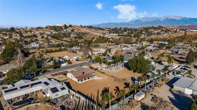 birds eye view of property featuring a mountain view