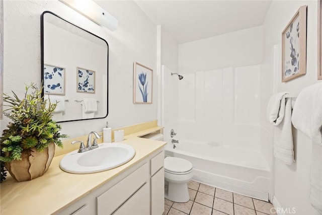 full bathroom with tile patterned floors, vanity, toilet, and washtub / shower combination