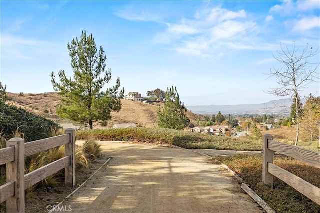 surrounding community featuring a mountain view