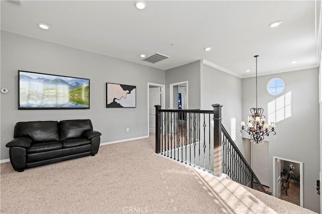 interior space featuring ornamental molding, a chandelier, and carpet floors