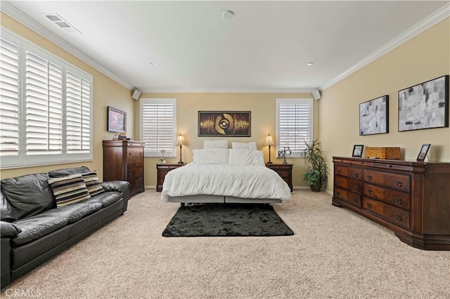 carpeted bedroom featuring crown molding