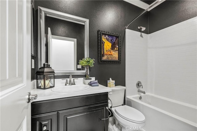 full bathroom featuring toilet, vanity, and  shower combination