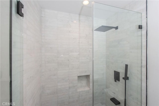 bathroom featuring an enclosed shower