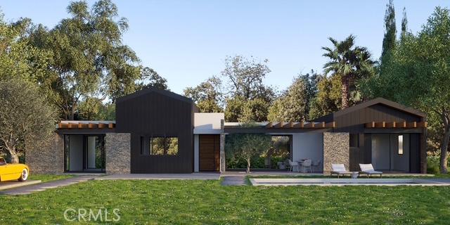 modern home featuring a front lawn