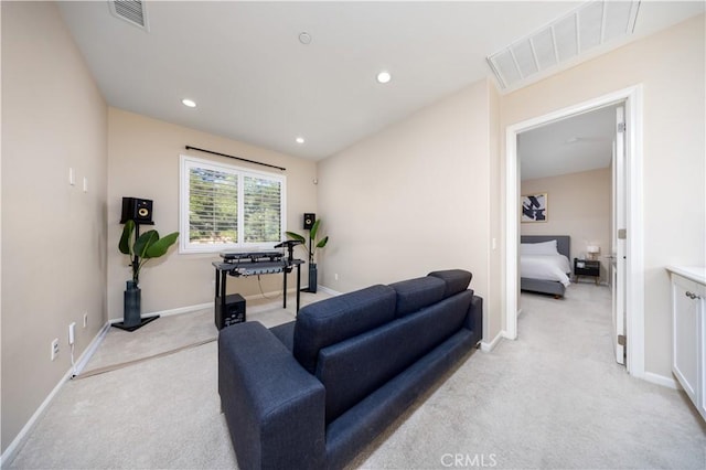 workout room with light colored carpet