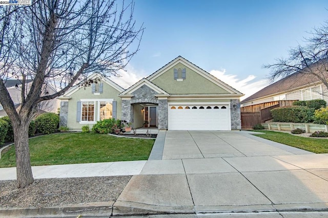 ranch-style house with a garage and a front lawn