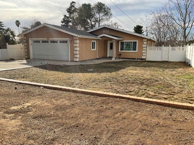 single story home featuring a garage