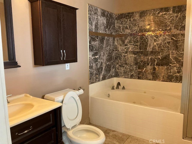 bathroom featuring vanity, toilet, tile patterned flooring, and a bathing tub