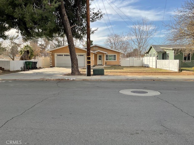 single story home with a garage