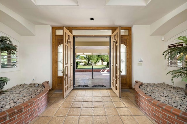 foyer entrance featuring plenty of natural light