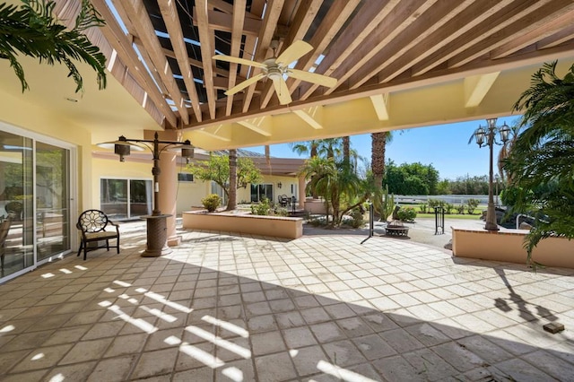 view of patio with ceiling fan